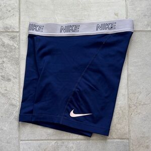 Nike Navy Athletic Shorts with Light Pink Swoosh and Gray Waistband